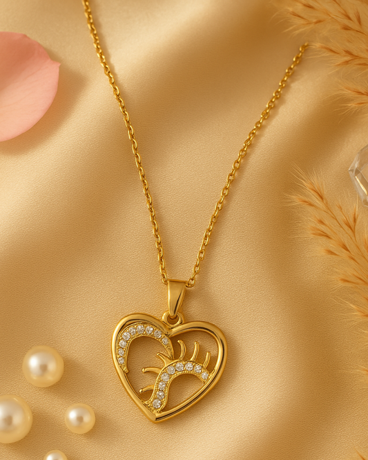 Gold-Toned Heart Pendant Necklace with Sun & Moon CZ Design
