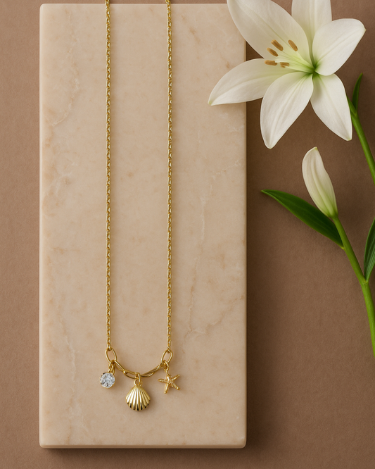 Ocean-Inspired Gold Charm Necklace – Seashell, Starfish & CZ Pendant