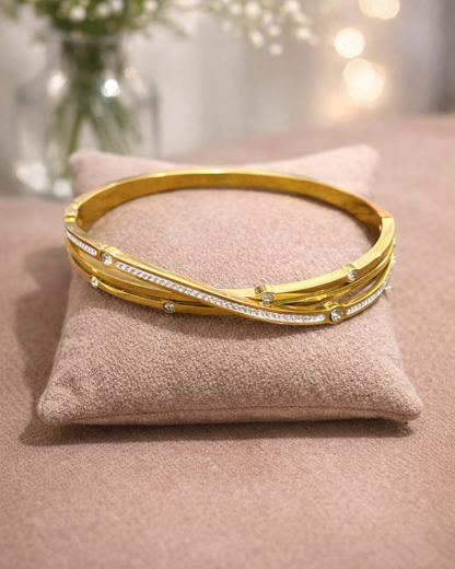 Elegant Gold Twist Bracelet with Zircon Detailing